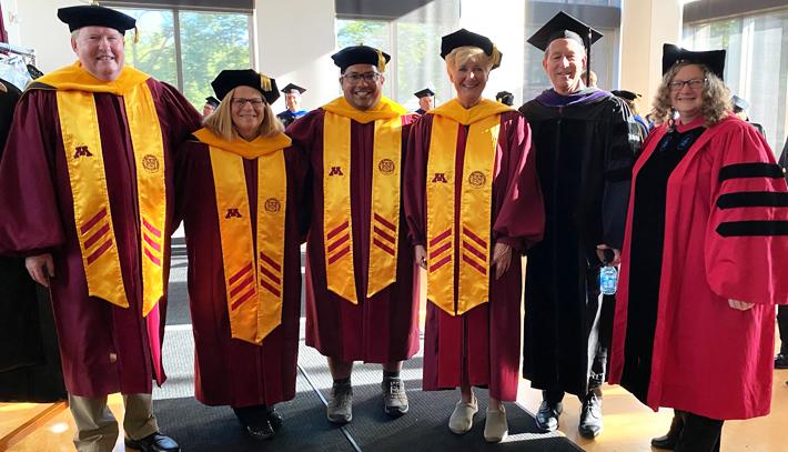 ɫС Huebsch, Wheeler, Farnsworth, and Turner participate in new student convocation.